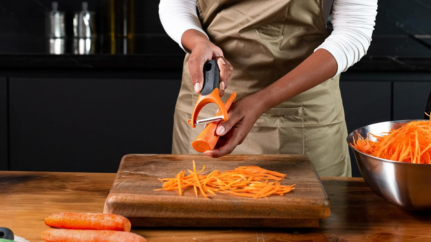 Zyliss Julienne Y Peeler – Ultra-Sharp Stainless Steel Blade for Carrots, Zucchini & Potatoes – Ergonomic Wheatstraw Grip – Built-in Eye Cutter & Safety Cover – Dishwasher Safe – Orange
