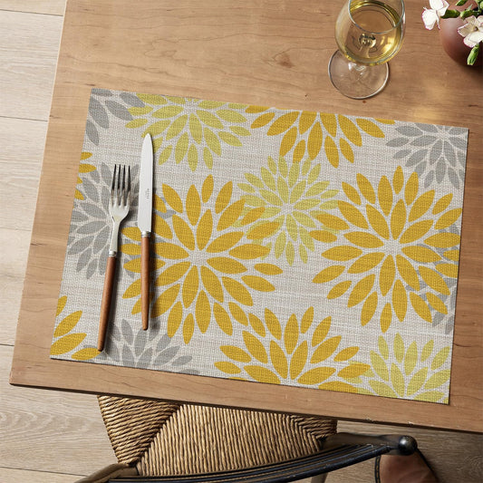Artoid Mode Floral Plastic Placemats Set of 6, 12x18 Inch Washable Non-Slip Plastic Vinyl Place Mats for Party Kitchen Dining Decor, Yellow