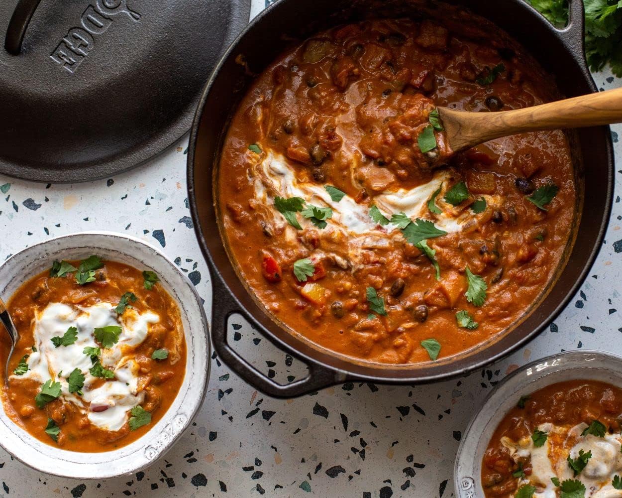 Lodge 5 Quart Cast Iron Dutch Oven. Pre-Seasoned Pot with Lid and Dual Loop Handle