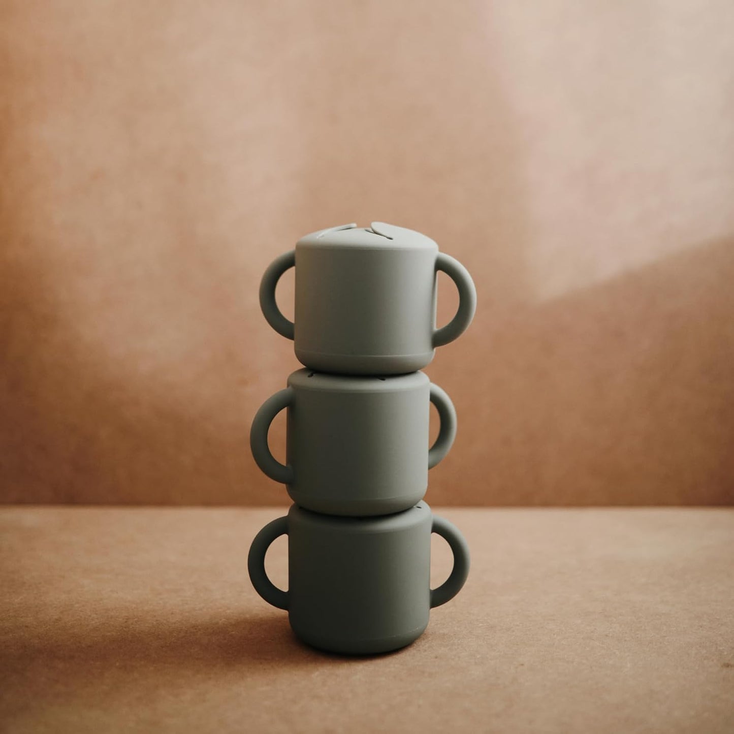 mushie Silicone Snack Cup | Spill Proof Food Container for Toddler and Baby (Dried Thyme)