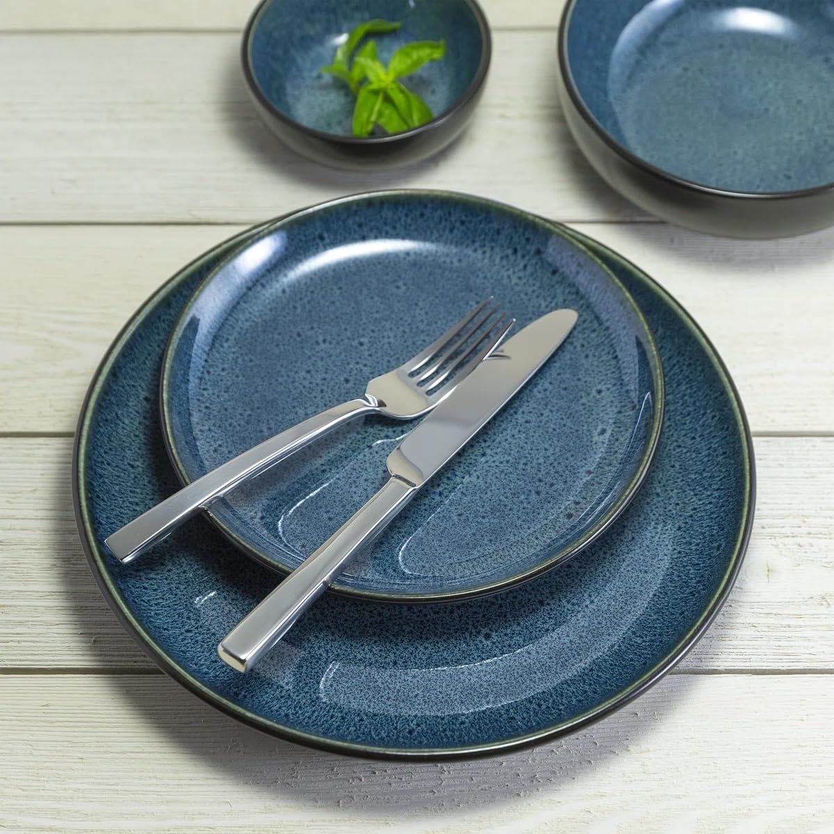 Sango 16-Piece Stoneware Dinnerware Set for 4, Glossy Black & Blue Plates and Bowls Sets with Reactive Glaze, Ceramic Dish Set, Modern Dishes for Everyday Dining, Microwave & Dishwasher Safe, Resona