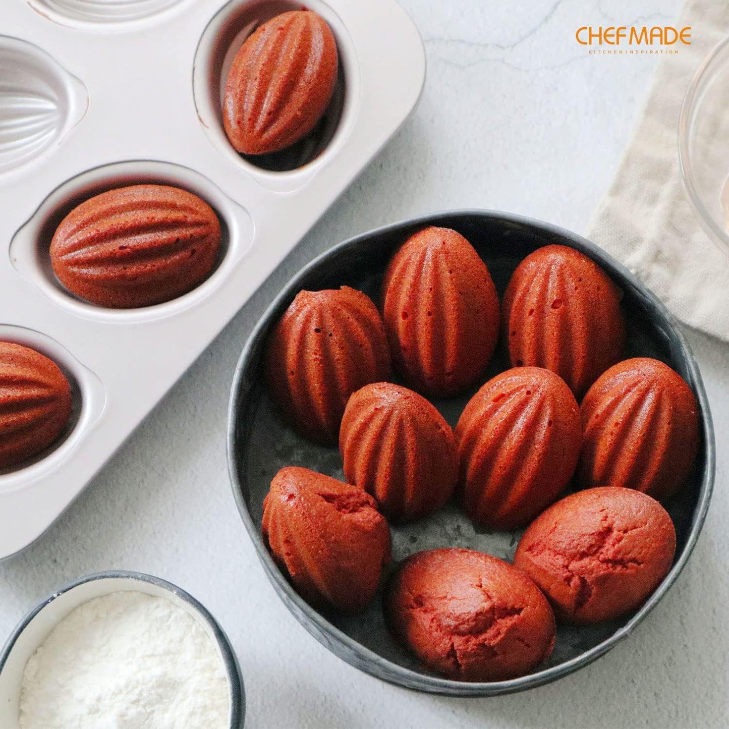 CHEFMADE Muffin Cake Pan, 12-Cavity Non-Stick Rugby-Shaped Bakeware for Oven Baking (Champagne Gold)