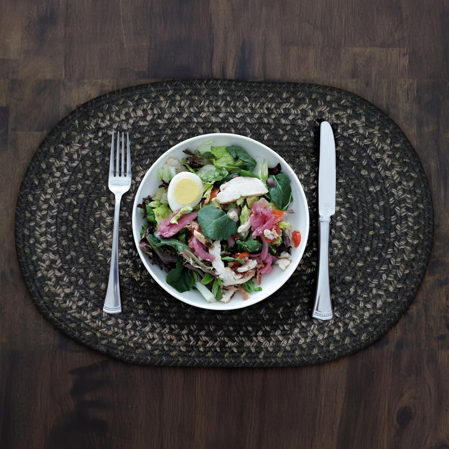 Homespice Jet Black Braided Oval Placemats, Warm Primitive Decor, Set of 6, 13x19 Jute Table Mats - Vibrant Colors, Durable, Easy to Clean and Protects Furniture