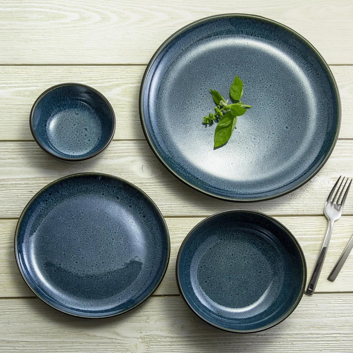 Sango 16-Piece Stoneware Dinnerware Set for 4, Glossy Black & Blue Plates and Bowls Sets with Reactive Glaze, Ceramic Dish Set, Modern Dishes for Everyday Dining, Microwave & Dishwasher Safe, Resona
